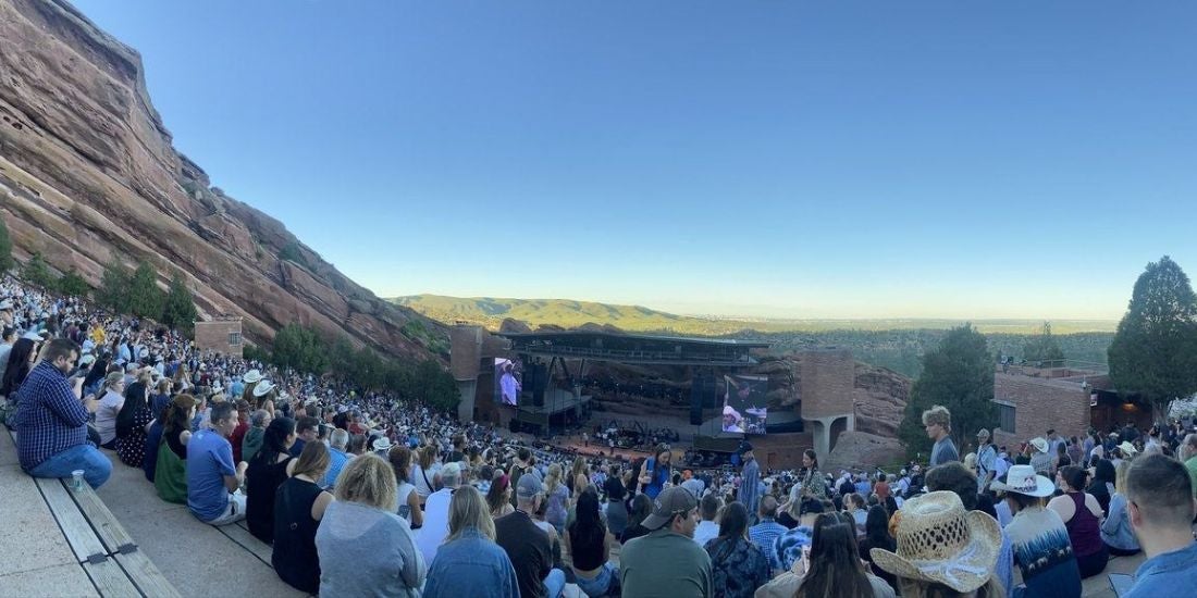 The view of the crowd and stage at Red Rocks.